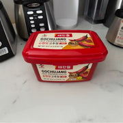 Lifestyle/use image: CJ Haechandle Gochujang hot pepper paste used in Korean cooking 1kg