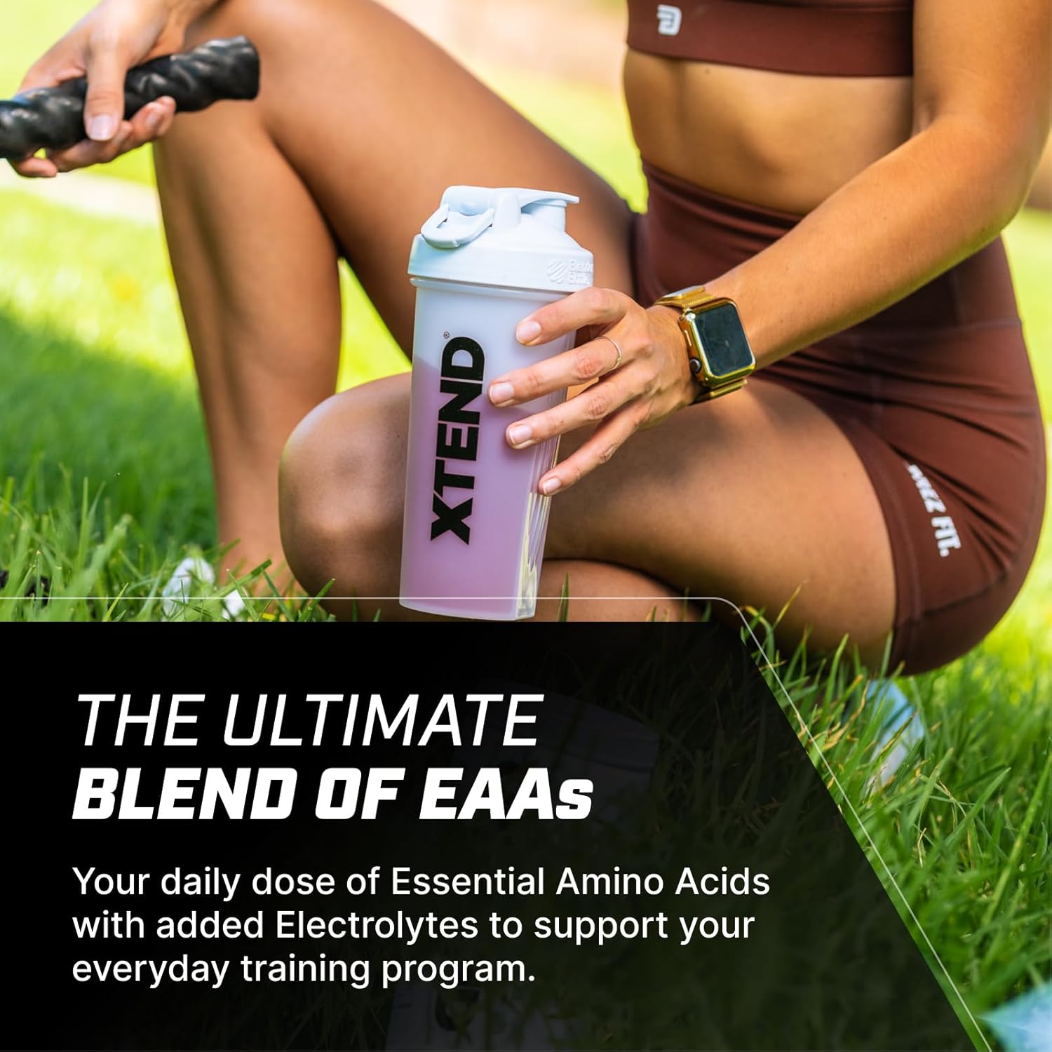 XTEND EAA Amino Acids Powder Tropical drink prepared in shaker tub powder 316g 40 servings
