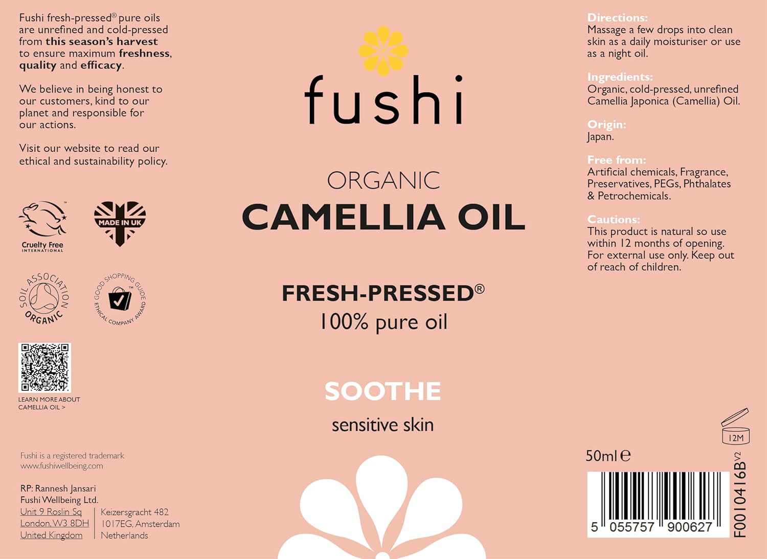 Fushi Organic Camellia Oil label on a pink background