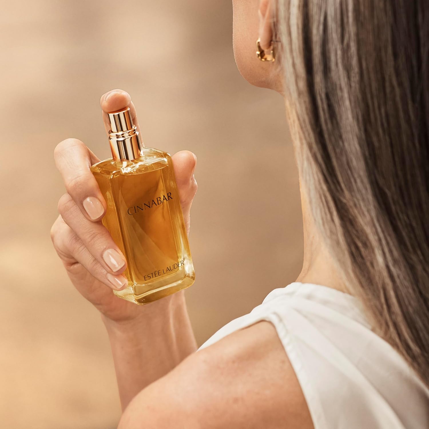 How to Use: Estée Lauder Cinnabar Eau de Parfum application instructions 50ml spray