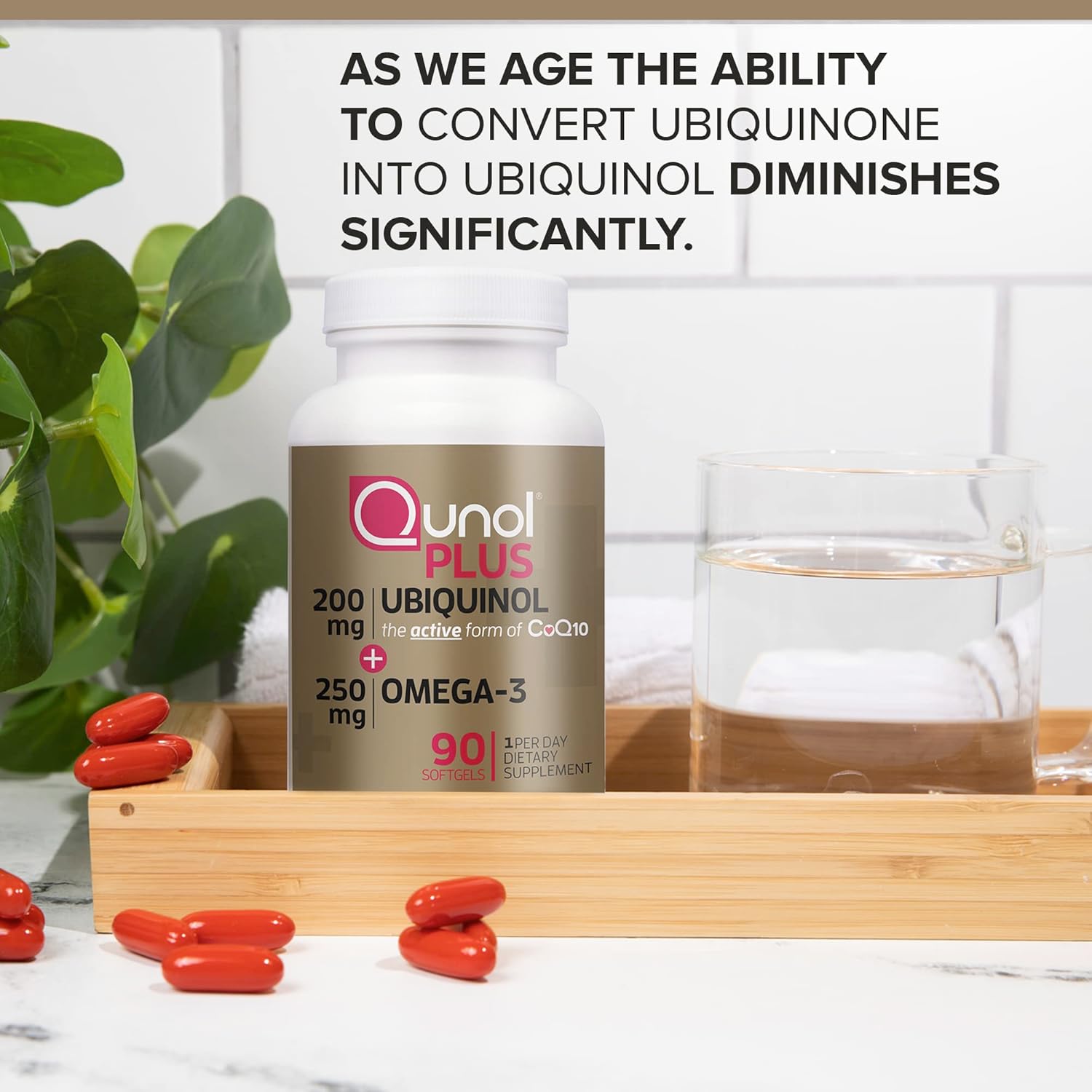 Lifestyle/use image: Qunol Ubiquinol CoQ10 omega-3 softgels daily supplement routine 90 count