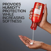 Redken Frizz Dismiss Conditioner bottle, 300ml, anti-frizz, formulation.