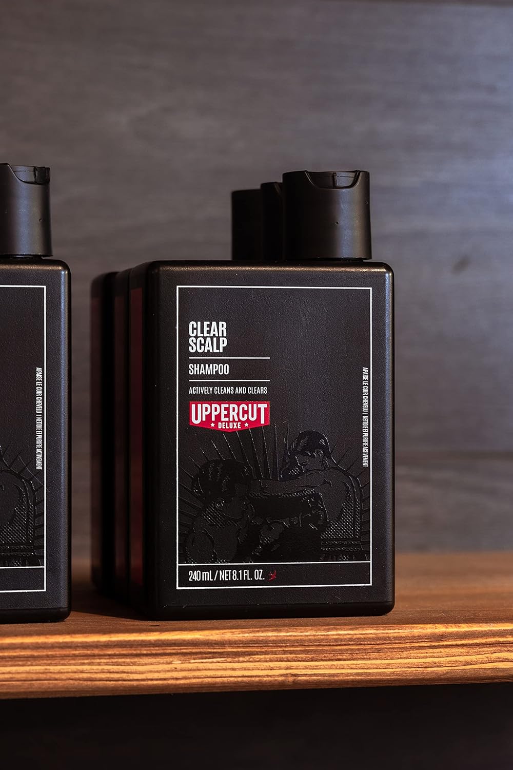 Lifestyle/use image: Uppercut Deluxe Clear Scalp Shampoo 240ml men hair care routine