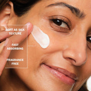 Applying Olay Retinol 24 Night Face Cream to face