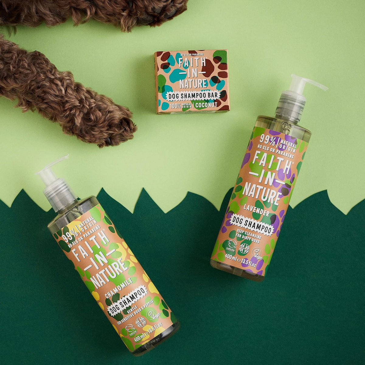 Faith In Nature Gentle Dog & Puppies Chamomile Shampoo 400ml bottle packaging being used on a dog