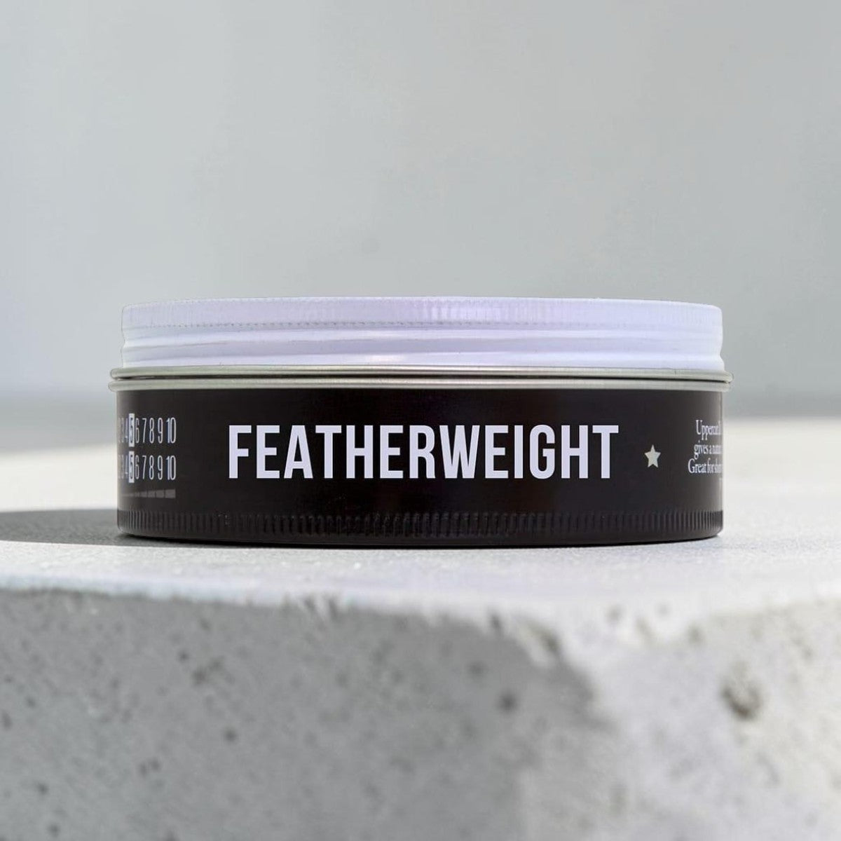 Uppercut Deluxe Featherweight Fiber Paste 70g jar firm hold styling paste packaging