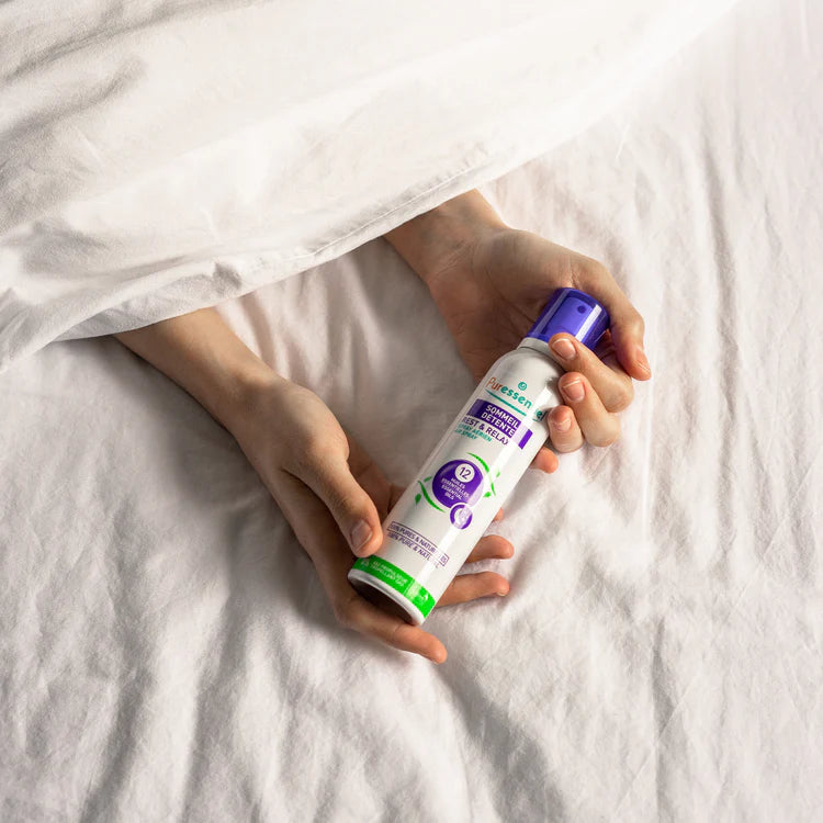 Puressentiel air mist into a bedroom.